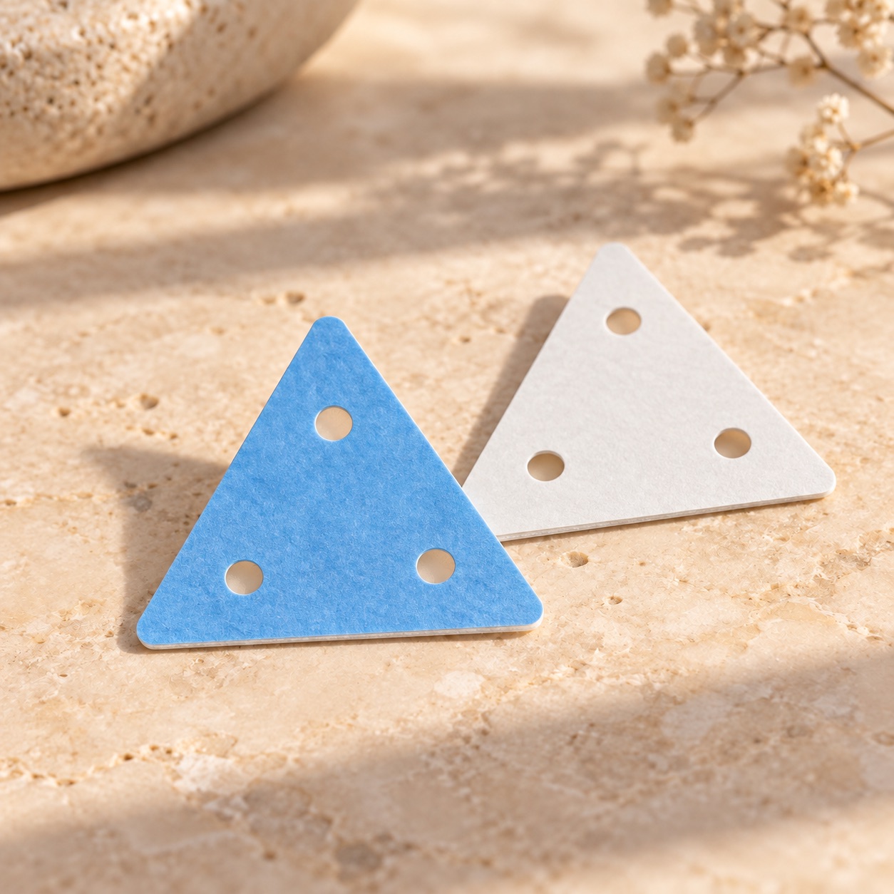 Illustrative detail of Perforated Blue Triangle Wig Tape Tabs · 36 Pieces